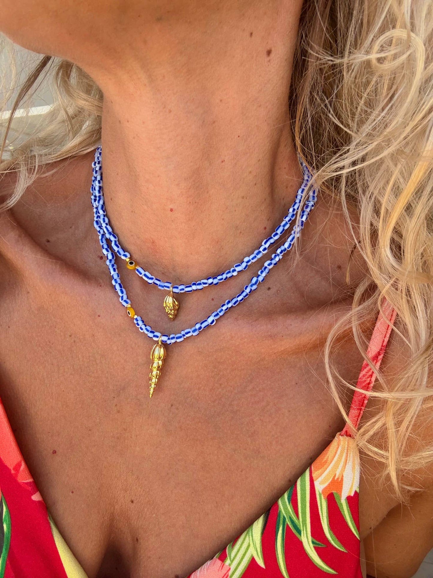 White and blue stripes beaded necklaces with gold shell: Small gold shell